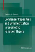 Condenser Capacities and Symmetrization in Geometric Function Theory