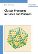 Cluster processes in gases and plasmas