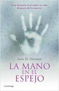 La mano en el espejo: Una historia real sobre la vida después de la muerte